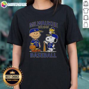 Top Charlie Brown, Snoopy, and Woodstock in Milwaukee Brewers jersey, Est. 1969, featured on a ladies tee.