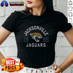 Alt Text: Hot Jacksonville Jaguars Heritage Print Ladies Tee featuring vibrant team colors and stylish design for fans.