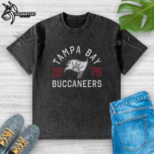 Alt Text: Official Tampa Bay Buccaneers Heritage Print Washed T-Shirt featuring team colors and logo, perfect for fans.