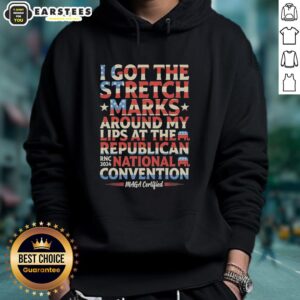 Person wearing a MAGA hoodie with stretch marks around lips at the Republican National Convention 2024.