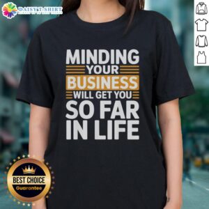 Vintage ladies tee featuring 'Minding Your Own Business Will Take You Very Far In Life' design, perfect for casual wear.