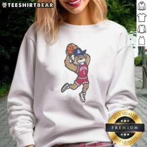Official Arizona Wildcats dunking Wilbur sweatshirt featuring vibrant team colors and mascot design for fans.