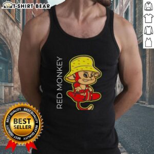 Angry red monkey wearing a tank top, showcasing a playful and vibrant personality in a colorful setting.