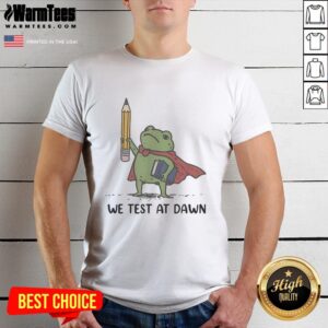 Alt Text: Good Teacher Frog holding a giant pencil and calculus book on a 'We Test at Dawn' T-shirt design