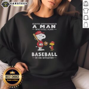 Cute Peanuts X St. Louis Cardinals sweatshirt featuring 'Never Underestimate A Man Who Still Plays Baseball In His Seventies'.