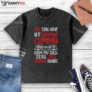 Funny quote on a washed t-shirt about the Oxford comma, perfect for grammar lovers and casual wear enthusiasts.