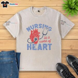 Hot Nursing Is A Work Of Heart ash washed t-shirt featuring a stylish design for passionate nurses.