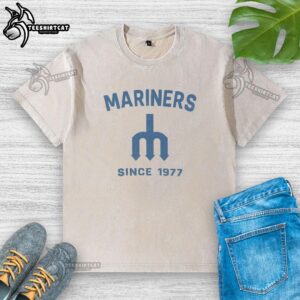 Premium Seattle Mariners Cooperstown Duster Washed T-Shirt displayed on a hanger, featuring vintage design and soft fabric.