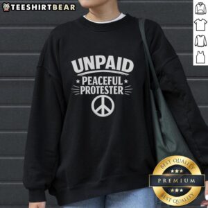 Alt Text: Top Unpaid Peaceful Protester Logo Sweatshirt featuring a bold graphic and vibrant colors, perfect for activism enthusiasts.