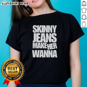 Stylish woman in awesome skinny jeans, wearing a trendy 'Wanna' ladies tee, showcasing a chic casual outfit.