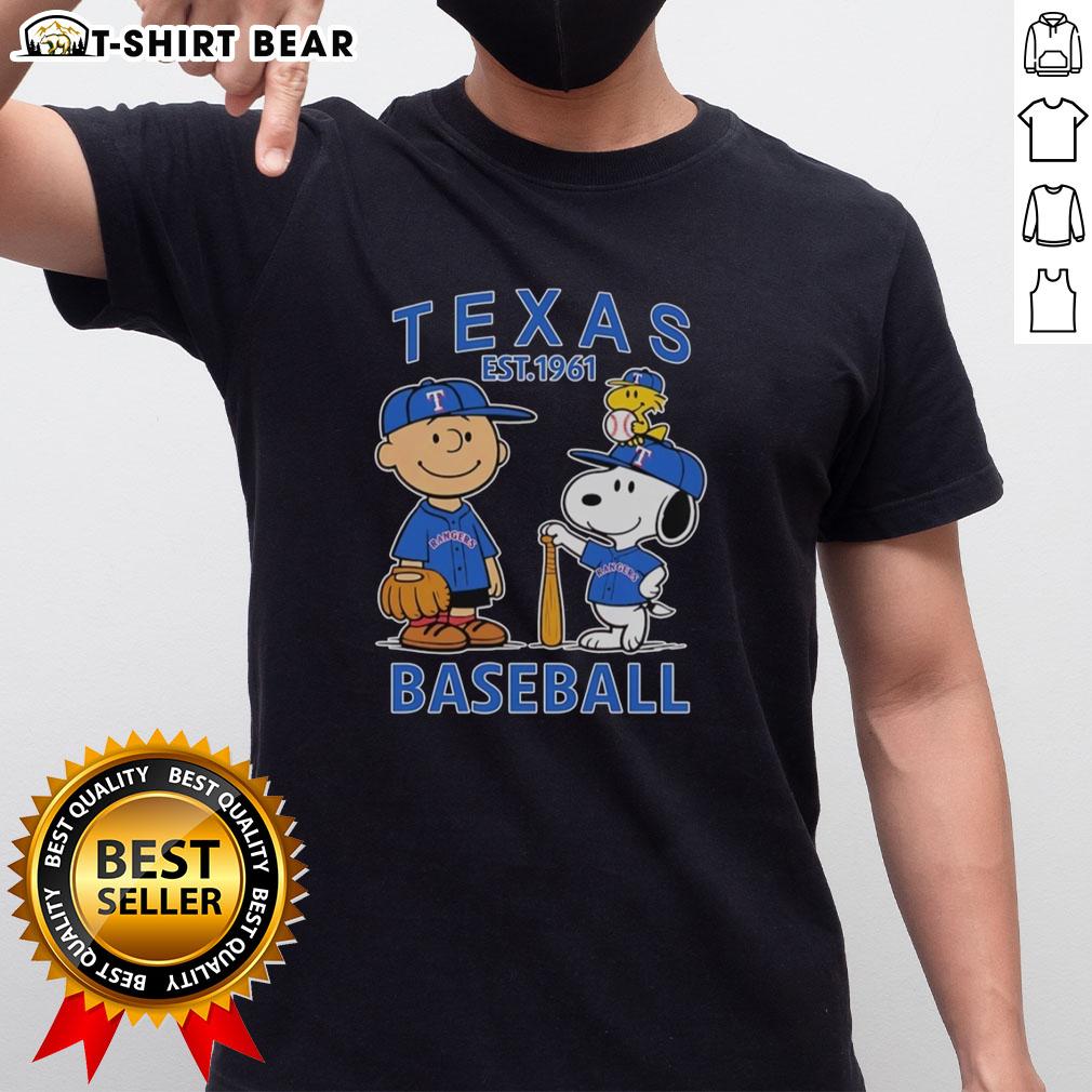 Good Charlie Brown Snoopy And Woodstock With Texas Rangers Baseball Jersey Est 1961 T-Shirt Alt Text: Good Charlie Brown, Snoopy, and Woodstock wearing Texas Rangers baseball jersey Est 1961 T-shirt, perfect for fans.