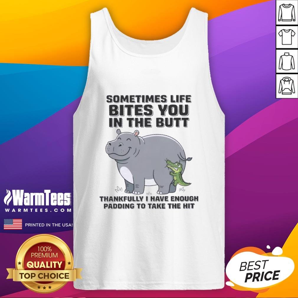 good-hippo-sometimes-life-bites-you-in-the-butt-thankfully-i-have-enough-padding-to-take-the-hit-tank-top Good Hippo tank top featuring humorous quote about lifes challenges and resilience with playful design elements.