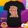 Good Our Enemies Aren't In Iran They Are In The Epstein Files T-Shirt design featuring bold text and a striking graphic.