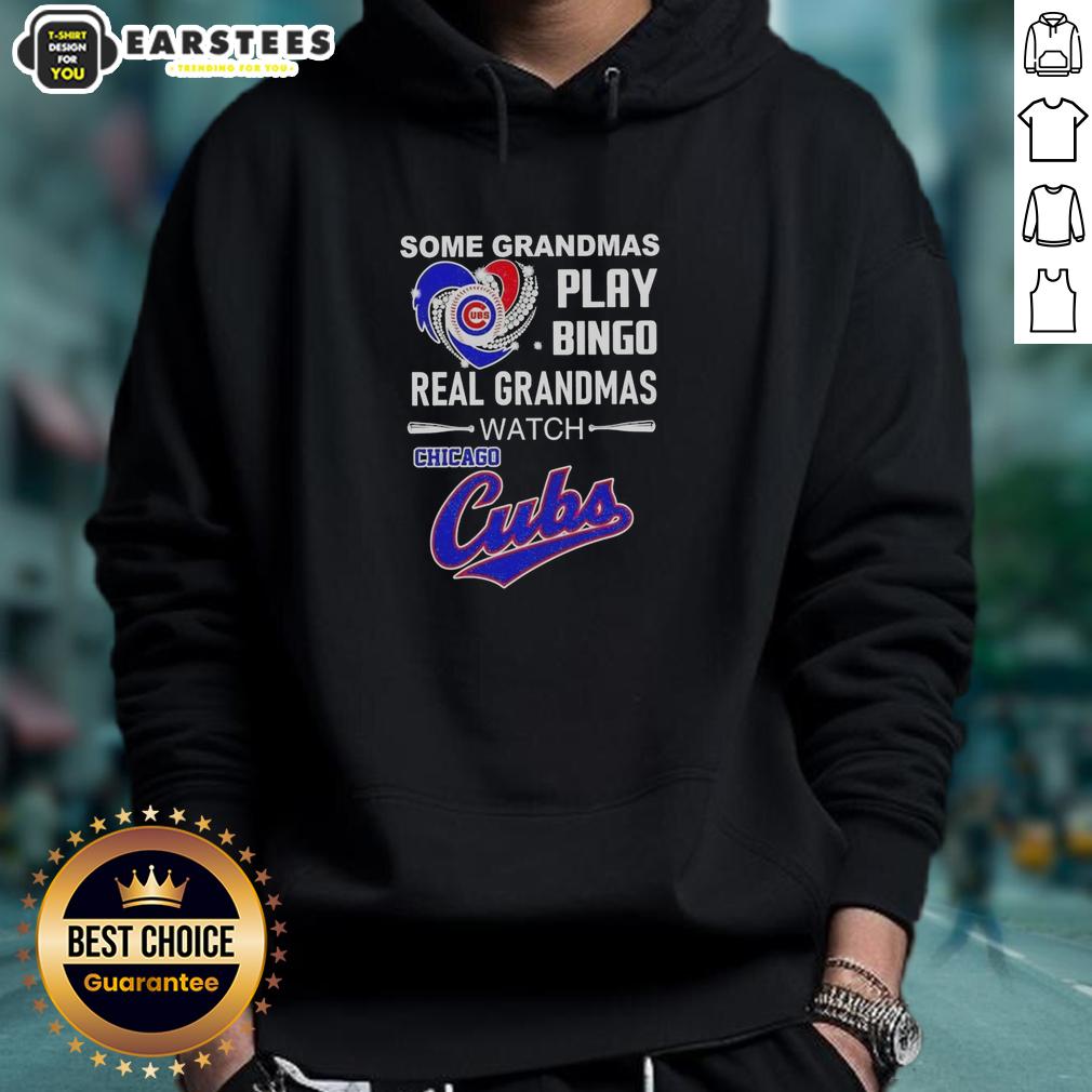 good-some-grandmas-play-bingo-real-grandmas-watch-chicago-cubs-hoodie Grandma wearing a Chicago Cubs hoodie, showcasing her love for the team while enjoying a game day at home.