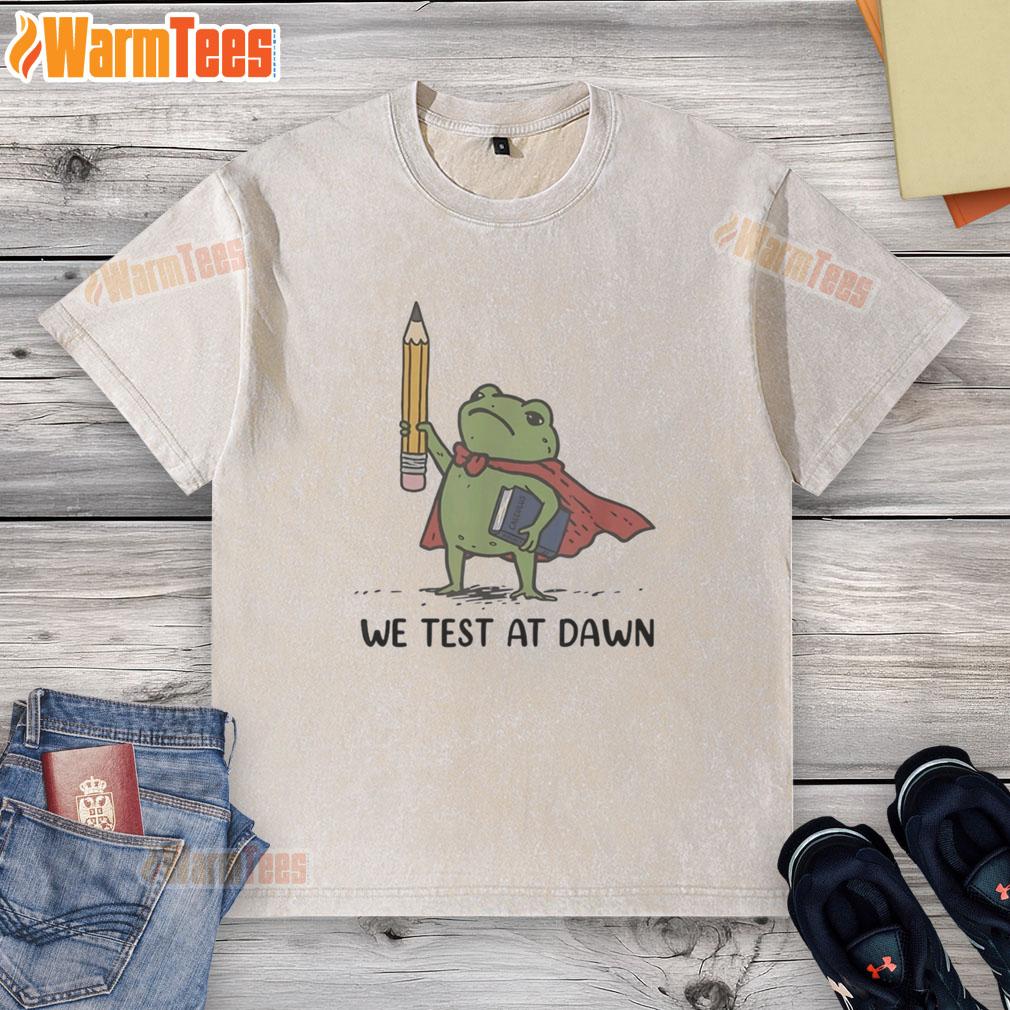 good-teacher-frog-holding-giant-pencil-and-calculus-boook-we-test-at-dawn-washed-t-shirt Alt Text: Good teacher frog holding a giant pencil and calculus book, wearing a 'We Test at Dawn' washed t-shirt.