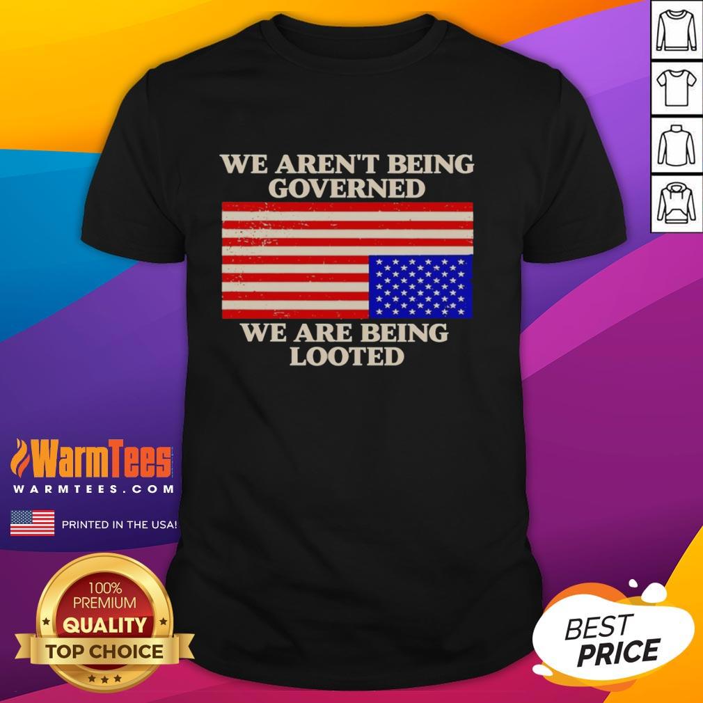 good-we-arent-being-governed-we-are-being-looted-t-shirt Alt Text: Good We Aren't Being Governed We Are Being Looted T-Shirt featuring bold text design on a casual tee.