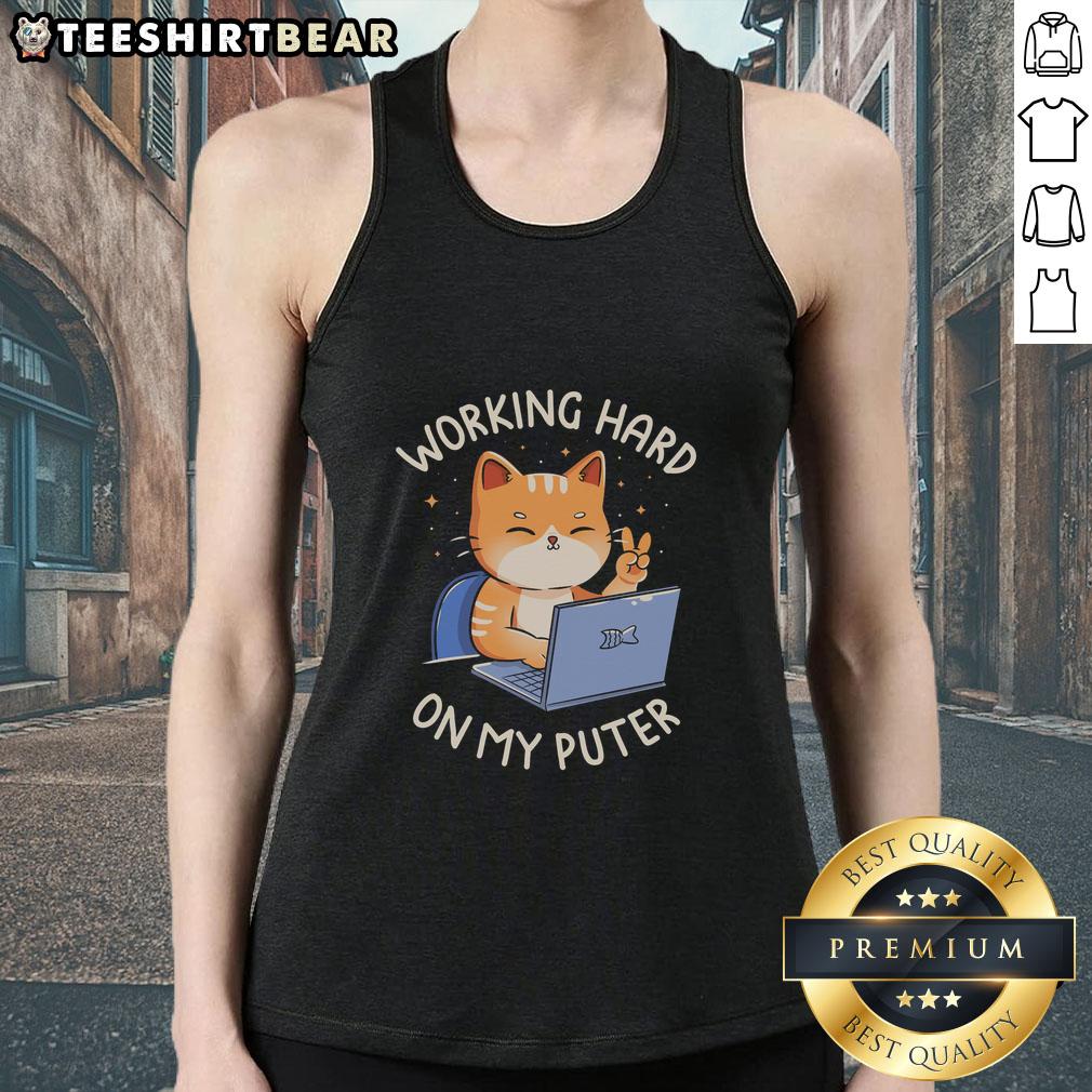 good-working-hard-on-my-puter-tank-top Person wearing a 'Good Working Hard On My Puter' tank top while focused on their laptop, showcasing dedication and style.