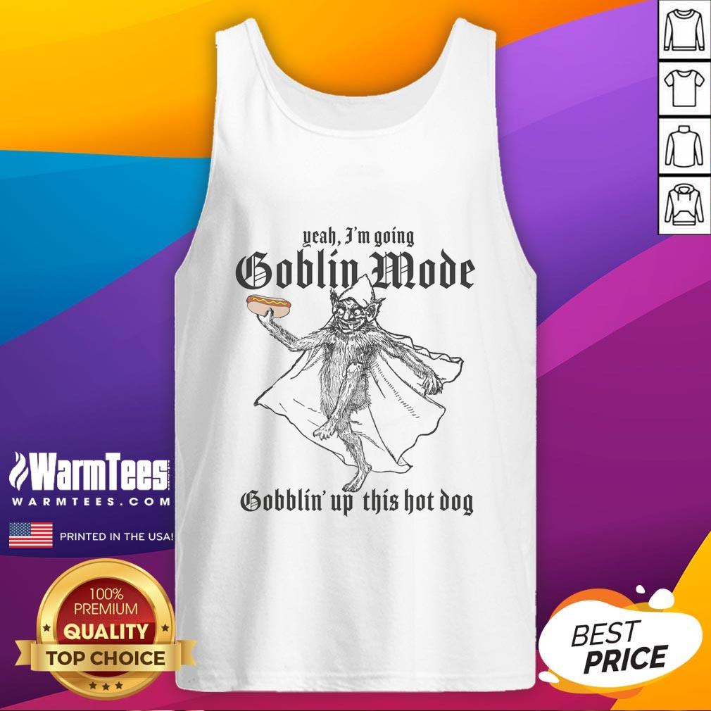 good-yeah-im-going-goblin-mode-gobblin-up-this-hot-dog-tank-top Person in a 'Goblin Mode' tank top enjoying a hot dog, showcasing fun and playful fashion for food lovers.