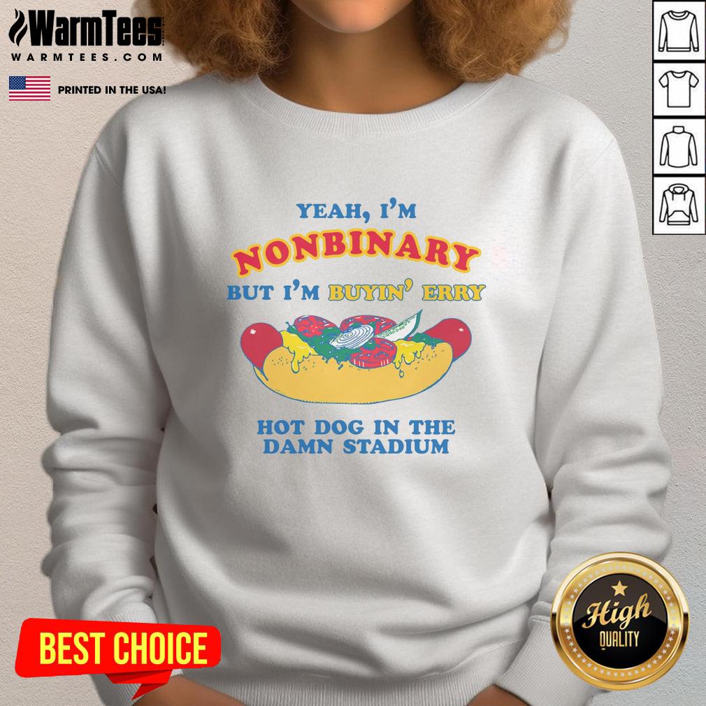 good-yeah-im-nonbinary-but-im-buyin-erry-hot-dog-in-the-stadium-sweatshirt Nonbinary individual wearing 'Good Yeah I'm Nonbinary But I'm Buyin' Erry Hot Dog' sweatshirt at a stadium, smiling happily.