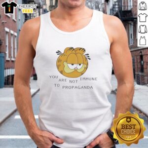 Premium Tabby Cat head graphic on a stylish tank top with 'You Are Not Immune to Propaganda' text.