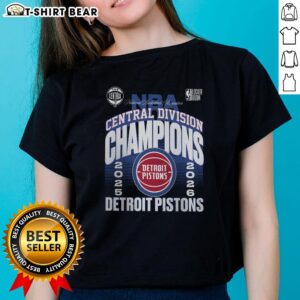 Alt Text: 2026 Central Division Champions locker room scene featuring a Detroit Pistons ladies tee celebrating their victory.