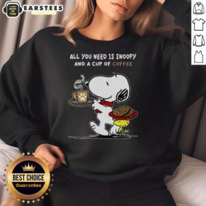 Alt Text: Cute 'All You Need Is Snoopy And A Cup Of Coffee' sweatshirt featuring Snoopy graphics and cozy design.