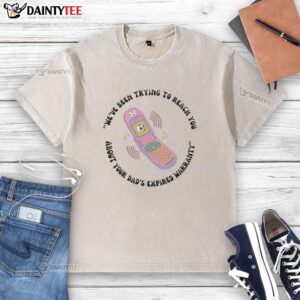 Alt Text: Funny 'Hot We've Been Trying To Reach You About Your Dad's Expired Warranty' toy phone graphic on a washed T-shirt.