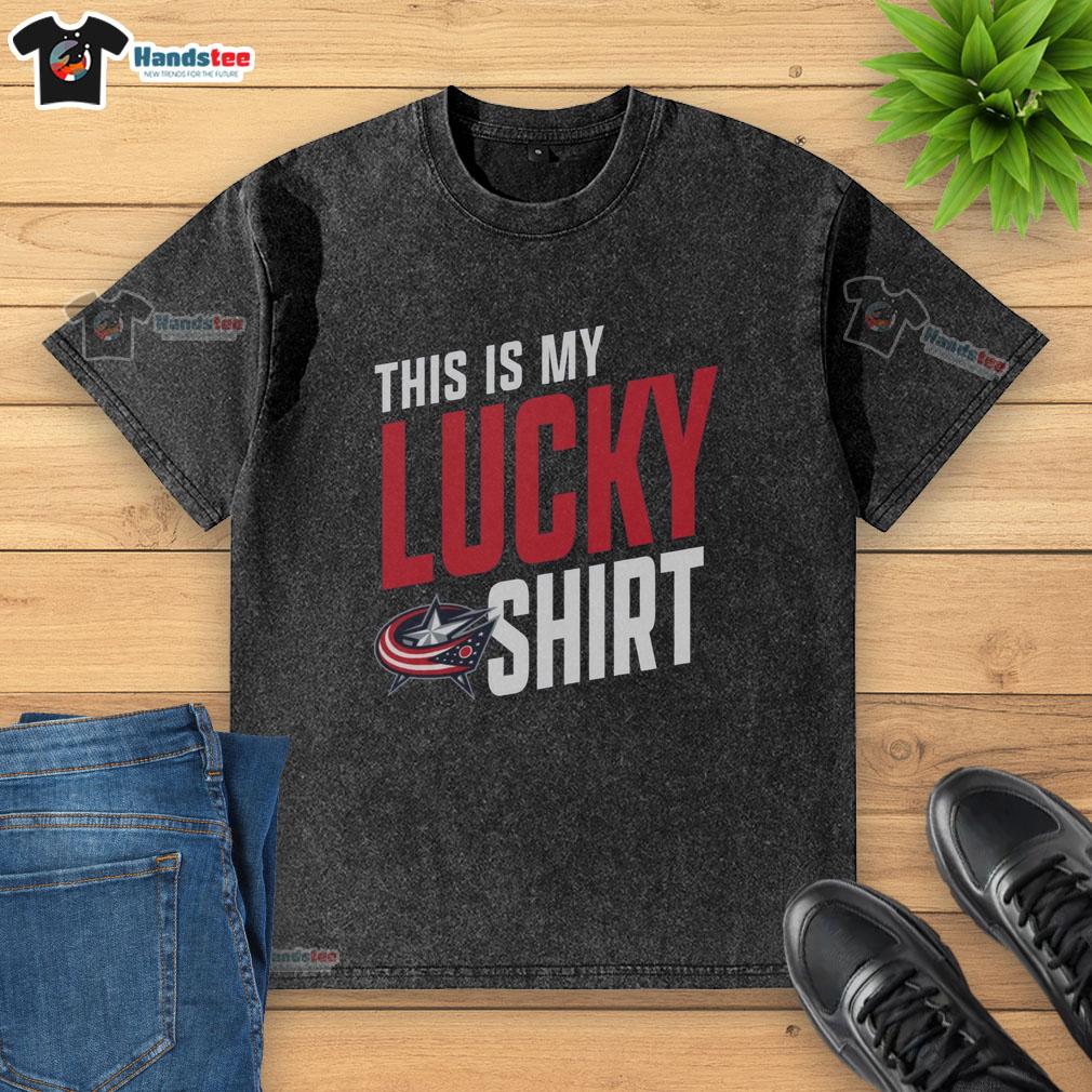 hot-columbus-blue-jackets-this-is-my-lucky-washed-t-shirt Hot Columbus Blue Jackets 'This Is My Lucky' washed t-shirt displayed on a hanger in a stylish setting.