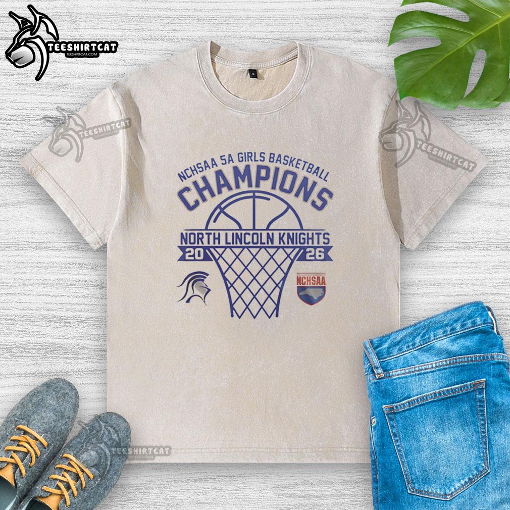 hot-north-lincoln-knights-nchsaa-5a-girls-basketball-champions-2026-washed-t-shirt Alt Text: Hot North Lincoln Knights NCHSAA 5A Girls Basketball Champions 2026 washed t-shirt featuring team colors and logo.