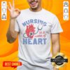 Alt Text: Hot Nursing Is A Work Of Heart Ash T-Shirt featuring a stylish design for passionate nurses.