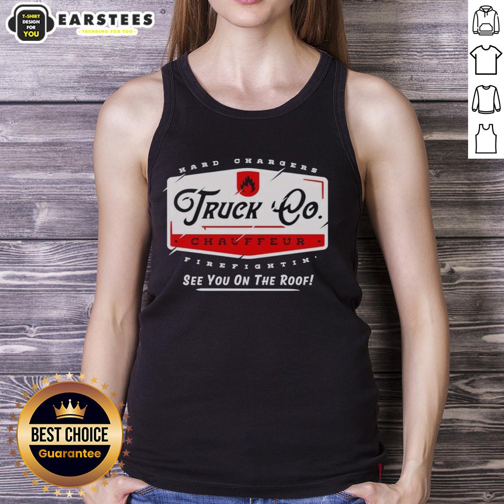hot-truck-chauffeur-hard-changers-firefightin-see-you-on-the-roof-tank-top Alt Text: Hot truck chauffeur wearing a Hard Changers Firefightin' See You On The Roof tank top, ready for action.