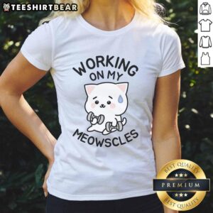 Top view of a woman wearing a 'Working On My Meowscles' ladies tee, showcasing a fun and stylish cat-themed workout shirt.
