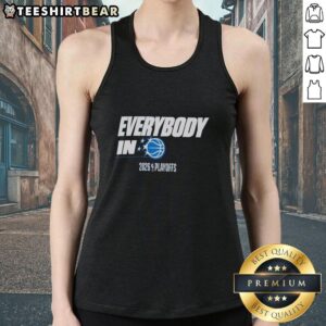 Orlando Magic fans in tank tops celebrate during the 2026 NBA Playoffs, showcasing team spirit and excitement.