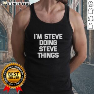 Top Im Steve wearing a tank top, showcasing his unique style while enjoying outdoor activities.