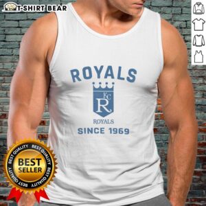 Alt Text: Stylish Kansas City Royals Cooperstown Duster tank top displayed on a rustic wooden background, perfect for fans.