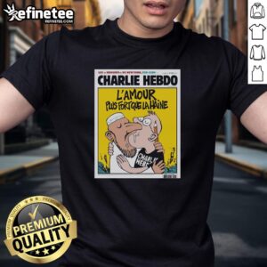 Official Two Men Kissing Charlie Hebdo T-Shirt featuring 'LAmour Plus Fort Que La Haine' message promoting love.