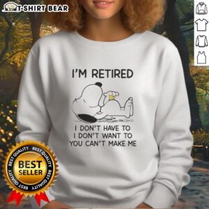 Snoopy and Woodstock graphic on a sweatshirt featuring 'I'm Retired, I Don't Have To, You Can't Make Me' quote.