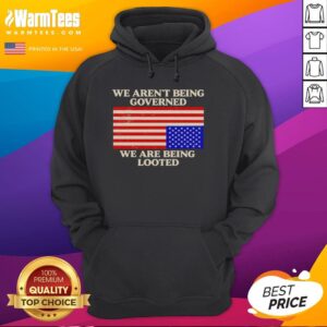 Alt Text: Black Good We Aren't Being Governed, We Are Being Looted hoodie displayed on a hanger, promoting social awareness.