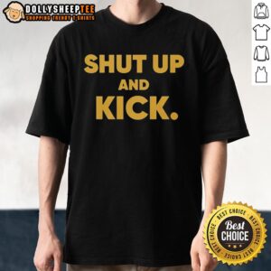 Alt Text: Official Harrison Butker of Kansas City Chiefs wearing a Shut Up And Kick T-shirt during a game.
