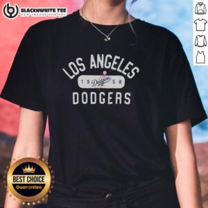 Alt Text: Top Los Angeles Dodgers 1958 logo on a stylish ladies tee, perfect for baseball fans and vintage apparel lovers.