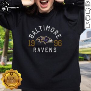 Alt Text: Premium Baltimore Ravens Heritage Print Sweatshirt featuring team logo and stylish design for fans.
