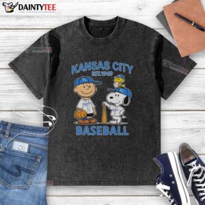 Alt Text: Charlie Brown, Snoopy, and Woodstock in Kansas City Royals baseball jersey, Est. 1969, on a washed T-shirt.