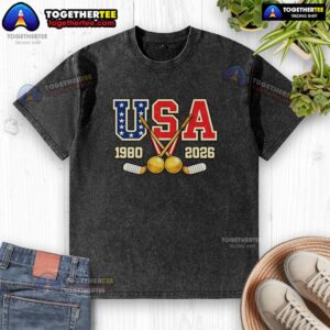 Vintage USA Champions washed t-shirt featuring 1980 and 2026 hockey graphics, perfect for sports fans and collectors.