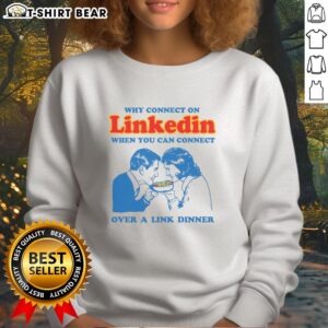 Cozy sweatshirt with slogan 'Connect Over A Link Dinner' emphasizing networking on LinkedIn in a fun way.