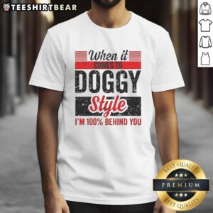 Awesome retro t-shirt featuring 'Doggy Style I'm 100 Percent Behind You' text, perfect for dog lovers and humor enthusiasts.
