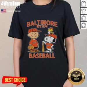 Alt Text: Cute Charlie Brown, Snoopy, and Woodstock wearing a Baltimore Orioles baseball jersey on a ladies tee, Est. 1894.
