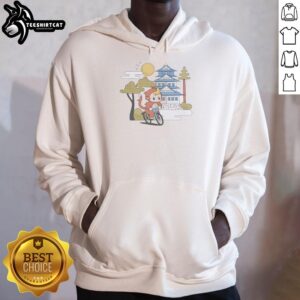 Cute monkey riding a bicycle wearing a 'Cdawgva Out For A Ride' hoodie, showcasing a playful and fun outdoor adventure.