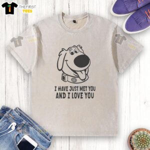 Cute dog wearing a 'I Just Met You and I Love You' washed t-shirt, showcasing its playful personality and charm.