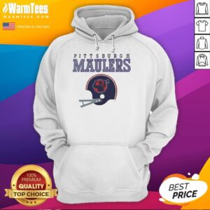 Alt Text: Original Pittsburgh Maulers USFL helmet and wordmark hoodie displayed on a wooden background, showcasing team pride.