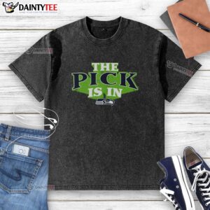Awesome Seattle Seahawks pick is in washed t-shirt featuring team colors and logo, perfect for fans.